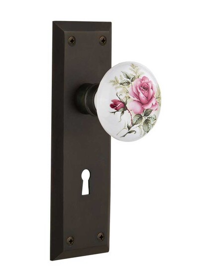 New York Plate with Rose Porcelain Knob with Keyhole in Oil Rubbed Bronze.